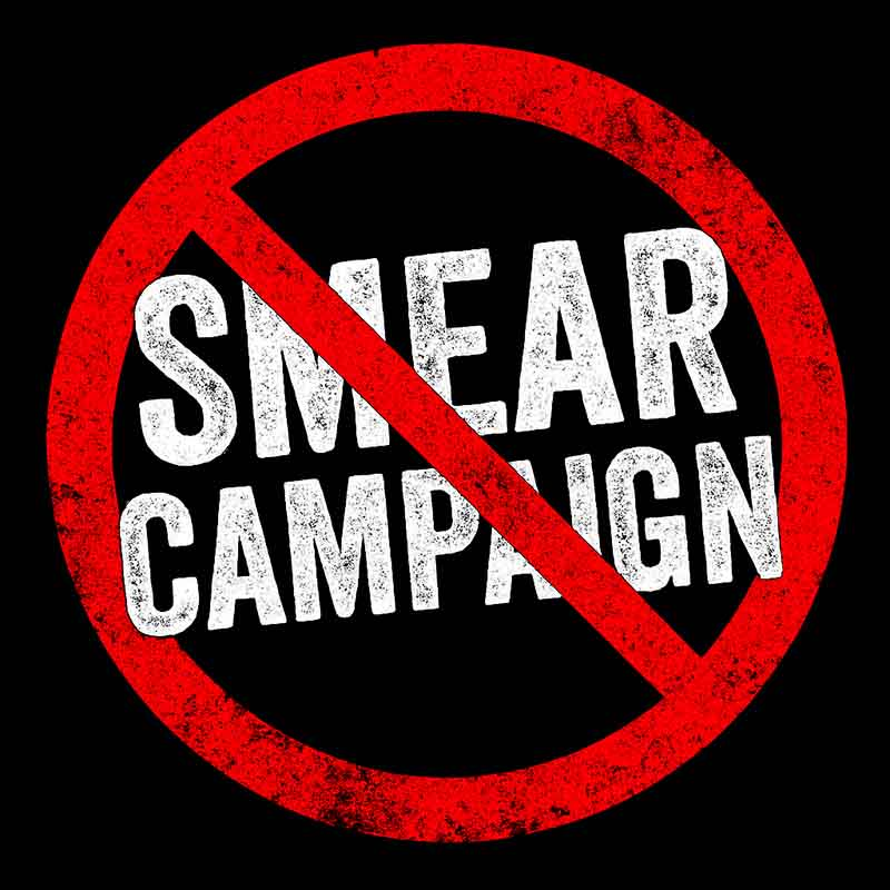 Smear campaign symbol crossed out inside a red circle