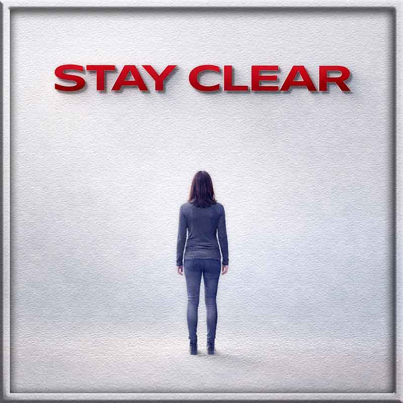 A lone figure stands with their back to the viewer beneath bold red text that reads Stay Clear
